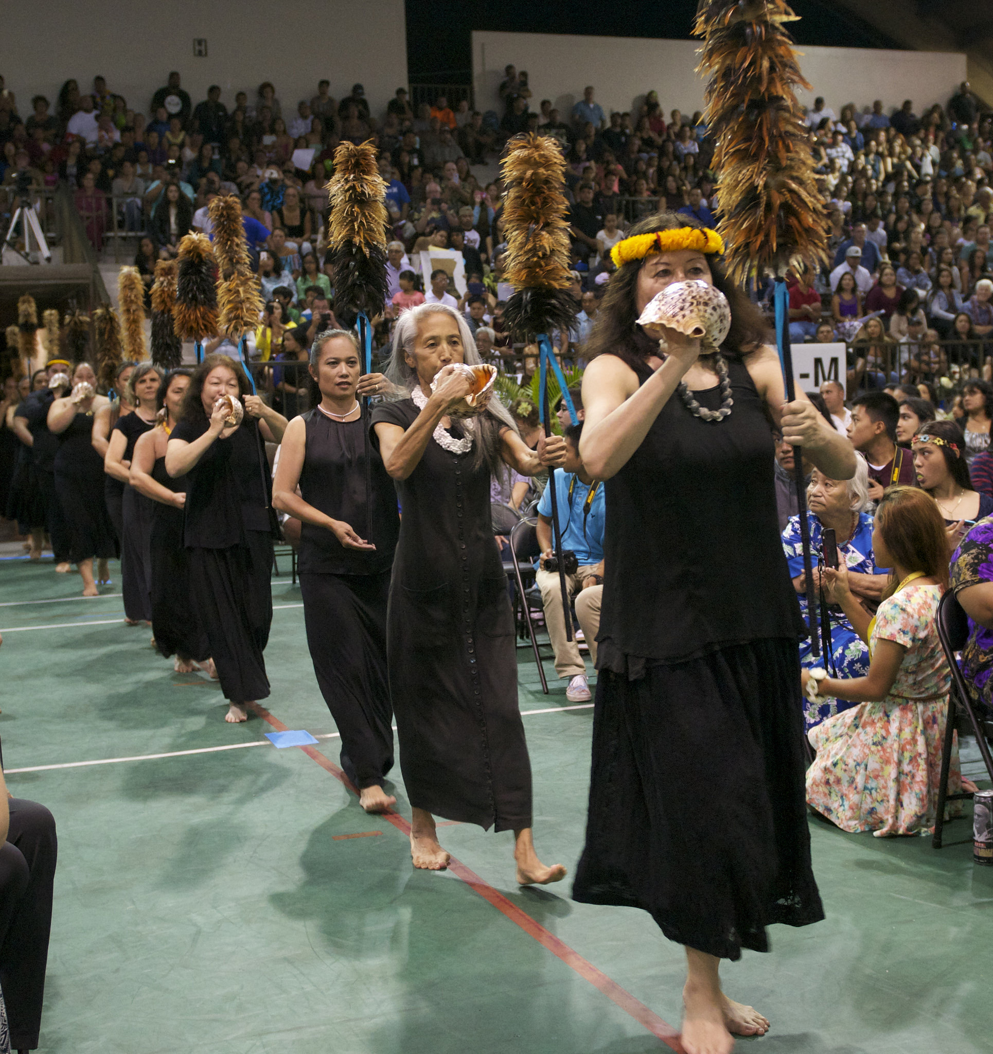 Trina Nahm-Mijo was in the first cohort of the Kūkū`enas, a mixed group of faculty, staff, and students started by Dr. Taupōouri Tangarō in 2009 to assist in Hawaiian protocols like Kīpaepae, pictured here at 2016 Hawai'i CC Graduation.