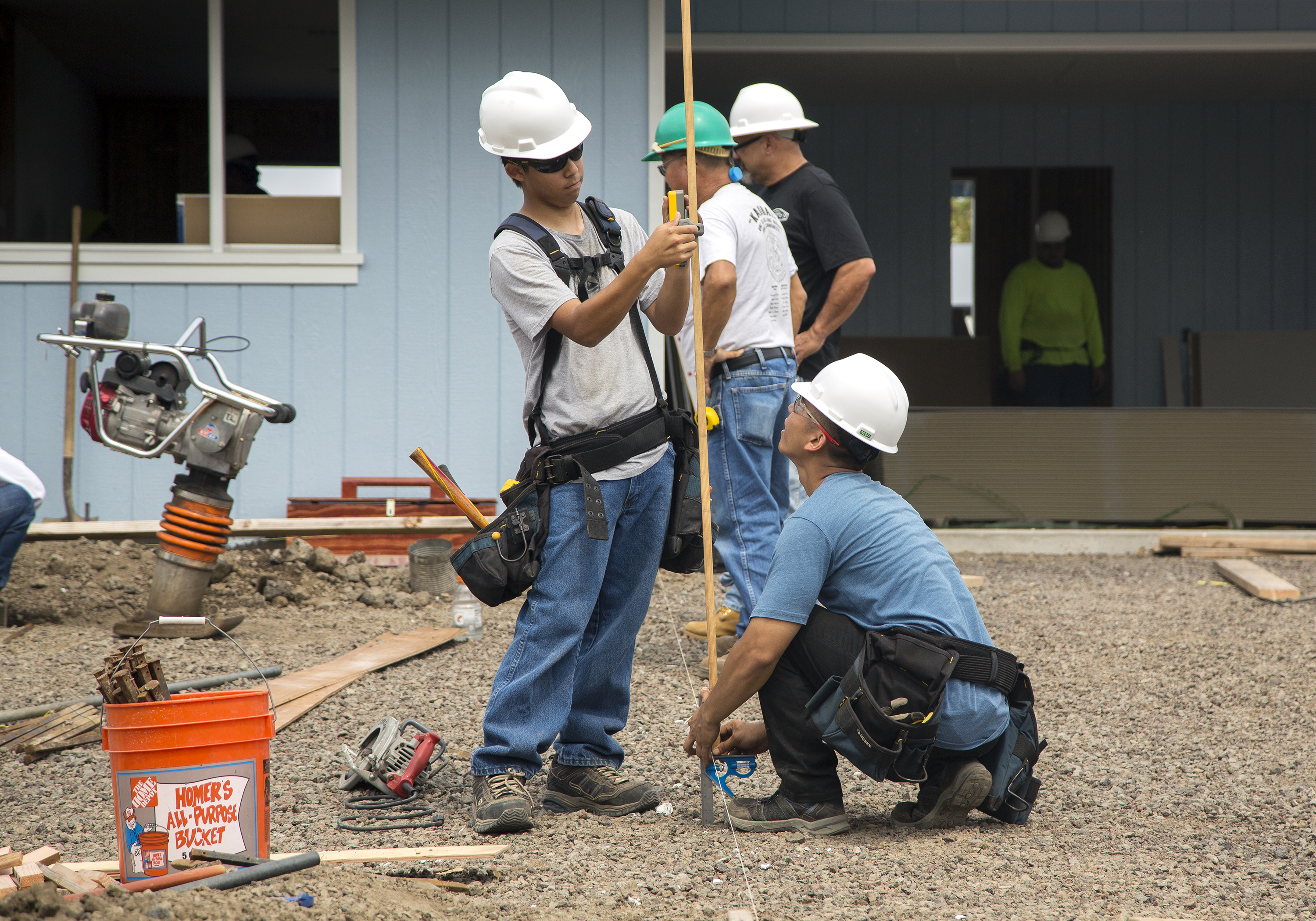 People doing carpentry work