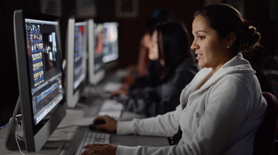 A Digital Media Arts student edits video 
