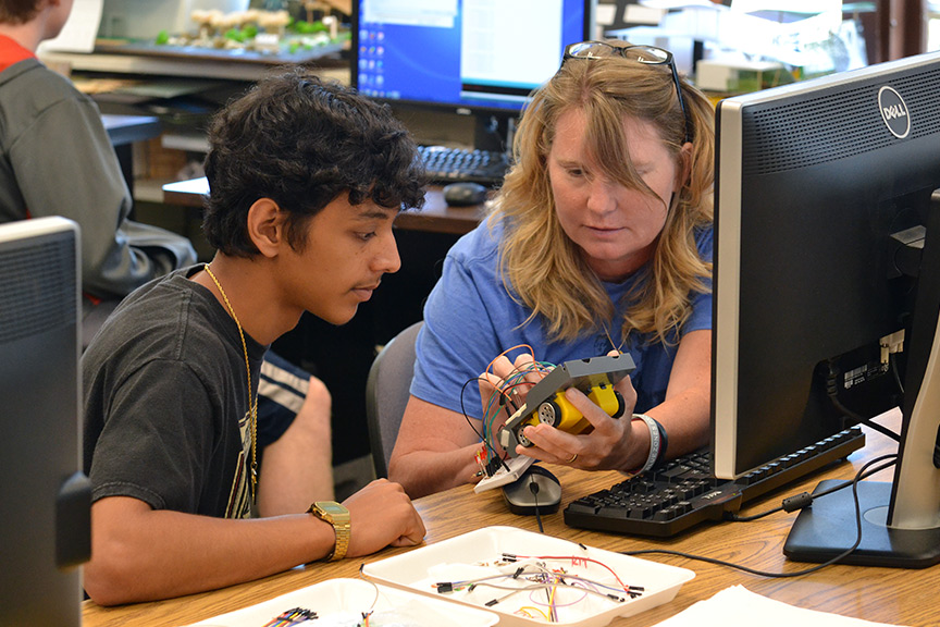 Student working on computer at Summer Engineering Academy