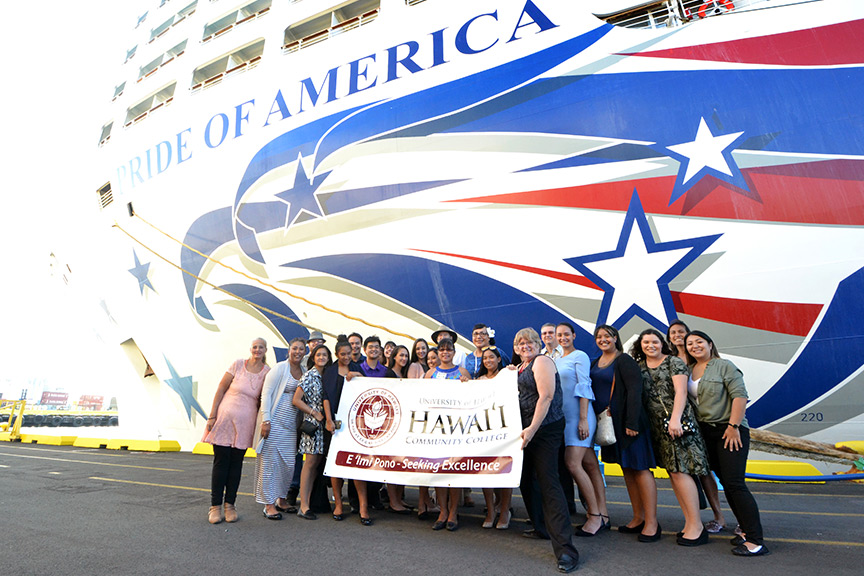 Group photo of students in front of Pride of America