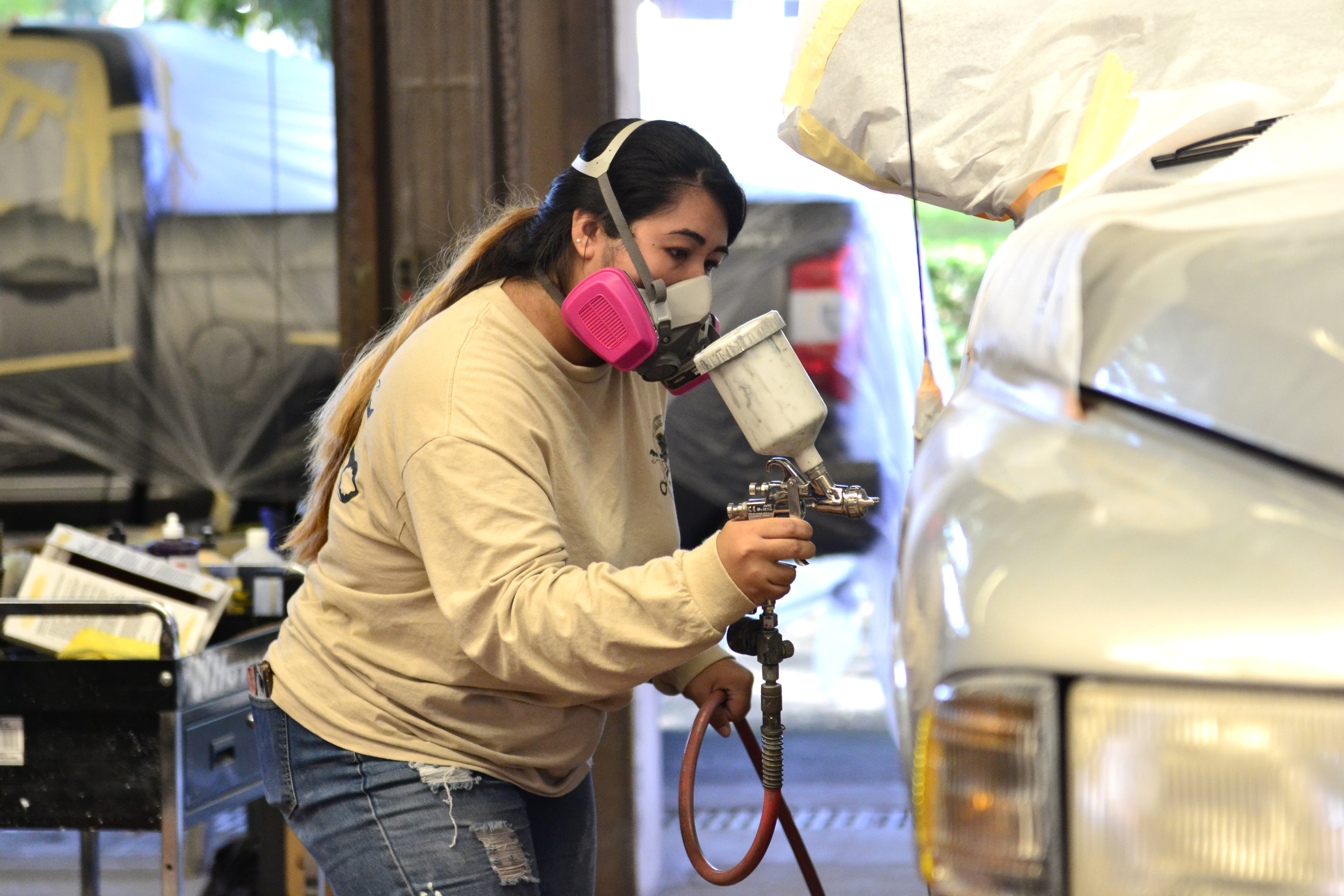 Shanaya Astrande at work in the Auto Body Repair and Painting shop in Hilo.