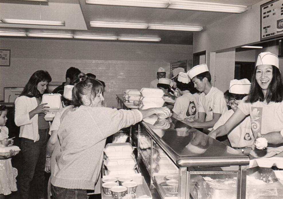 Trina Nahm-Mijo, far right, at a breakfast fundraiser event. 