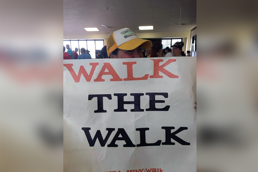 walk the walk sign