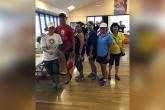 The Hawai'i Community College team poses for a photo at the Walk A Mile in Her Shoes event. From left to right are: Sherise Tiogango (Admissions and Records), Jason Cifra (Vice Chancellor of Student Affairs), Melany Ayudan (Student Affairs), Neva Supe-Roque (Instructional Technology Support Office), Rachel Solemsaas (Chancellor), Joni Onishi (Vice Chancellor of Academic Affairs).